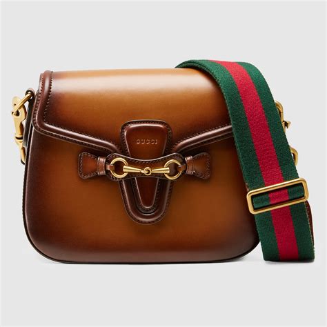 gucci web shoulder bag|cheapest gucci shoulder bag.